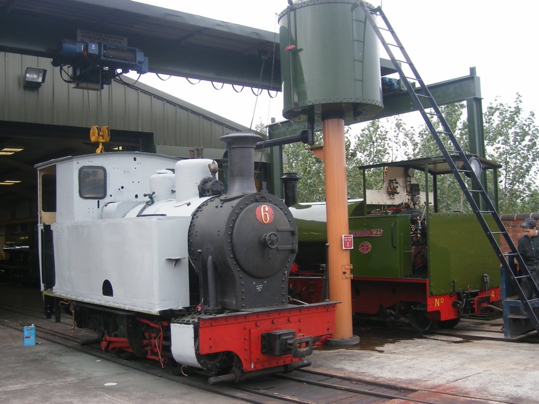 the loco sits outside the works next to resident Trangkil No 4